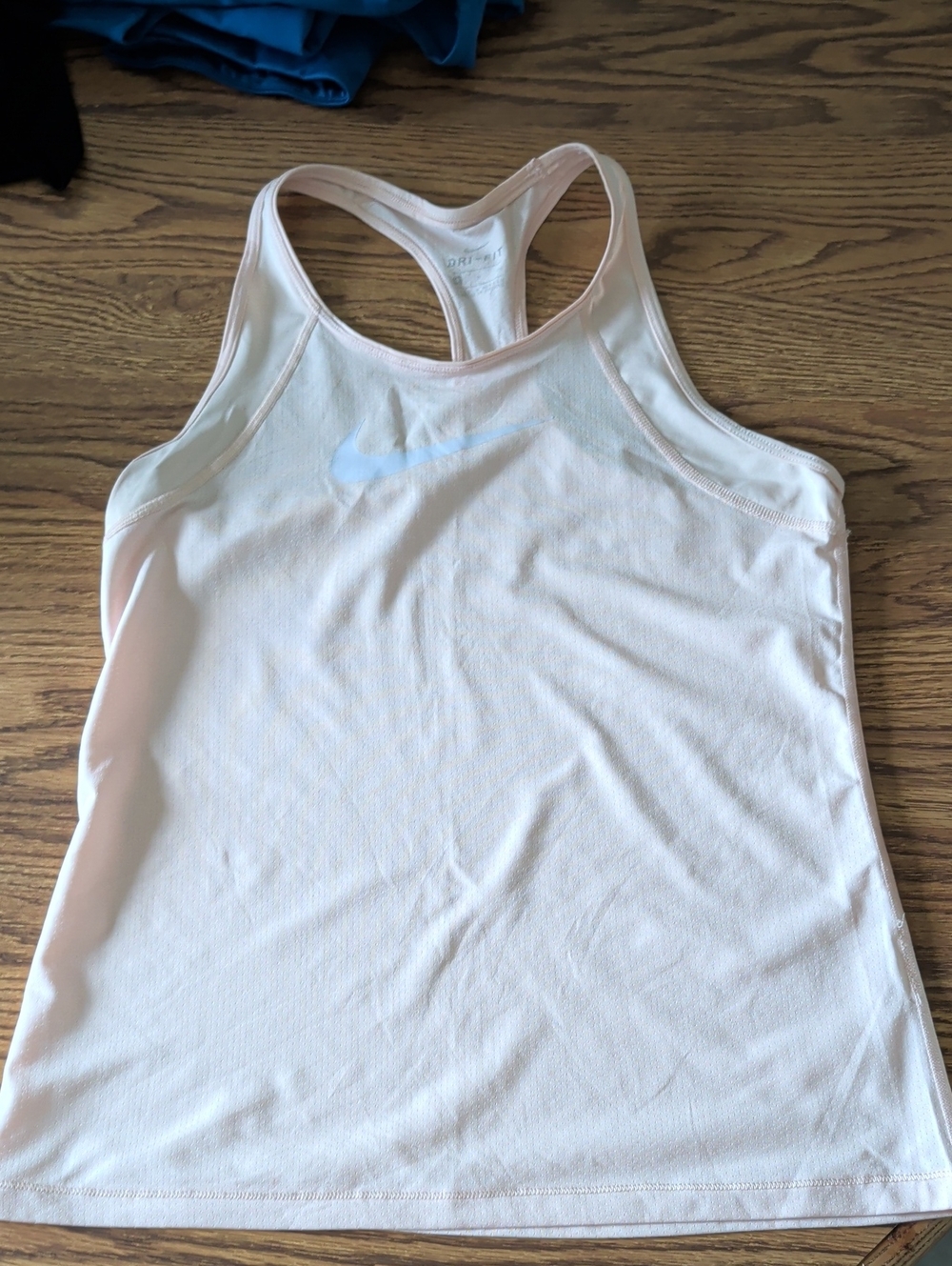 Nike Women's Pale Pink Racerback Tank with Subtle Swoosh